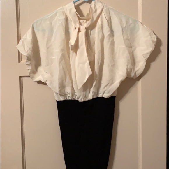 BCBG  BLACK AND WHITE TOP.  NEW WITH NO TAGS. SZ 0 - Picture 2 of 7